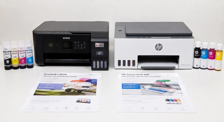 Epson EcoTank vs HP Smart Tank printers side by side on a desk showing refillable ink tank systems